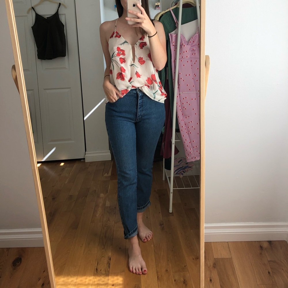 Beautiful floral tank with unique back.